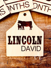 Load image into Gallery viewer, Custom Engraved Baby Milestone Tags Cow Eartag Milestones Baby Milestone Props
