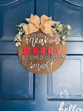 Load image into Gallery viewer, We are freaking merry but some of us, not so bright light up door sign christmas door hanger
