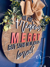 Load image into Gallery viewer, We are freaking merry but some of us, not so bright light up door sign christmas door hanger
